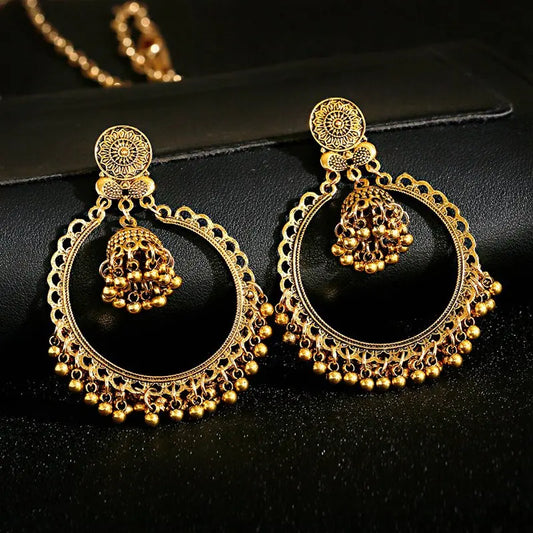 ✨ Regal Gold Jhumkas – Timeless Elegance