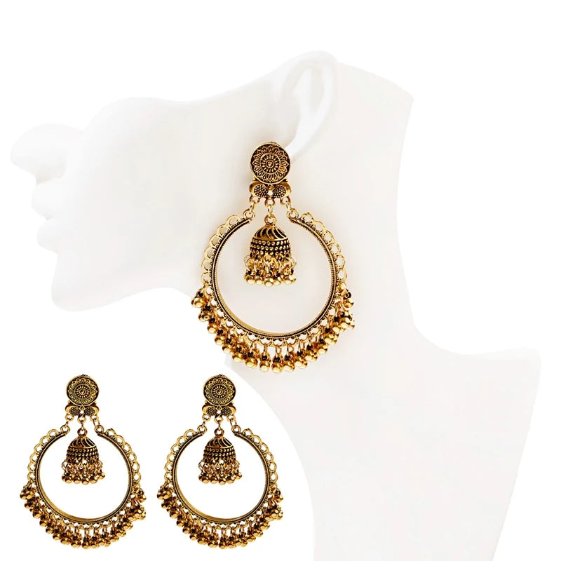 Regal Gold Jhumkas – Timeless Elegance